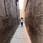 Tourist in Temple Corridor