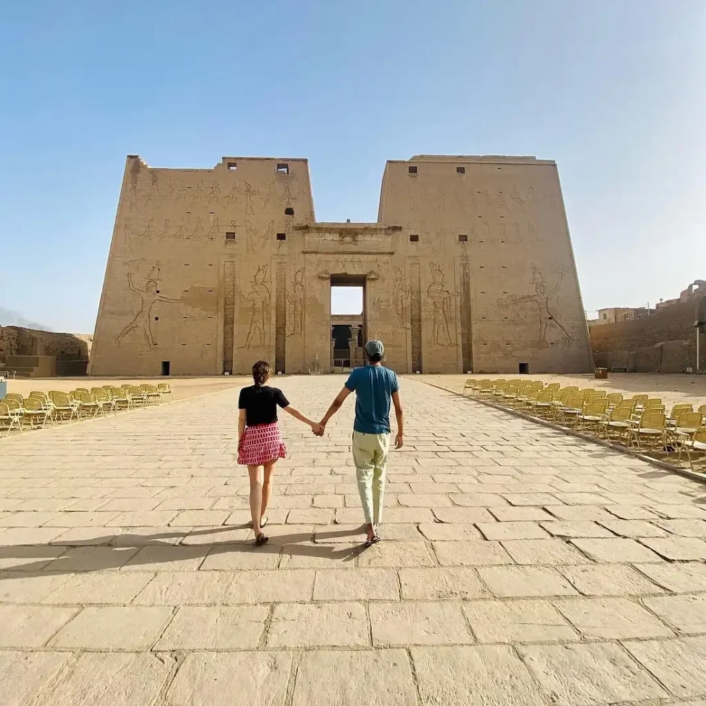 Couple Walking Towards Edfu Temple