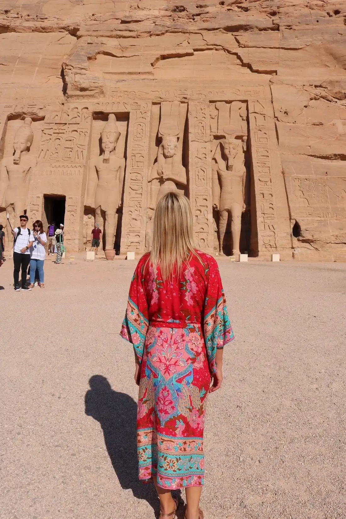 Tourists Standing in Front of the Temple